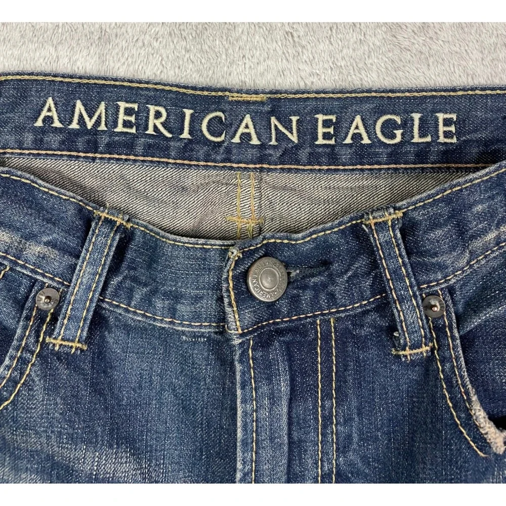 American Eagle Jeans Men Size 34 Low Rise Boot Cut Blue Denim Distressed Casual